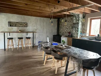Coin salon dans l'établissement Grande maison conviviale