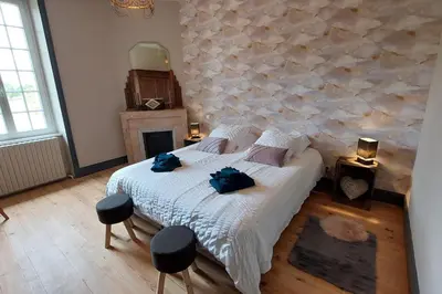 Un ou plusieurs lits dans un hébergement de l'établissement Gîte d'exception avec piscine chauffée pour 12 personnes - Cantal