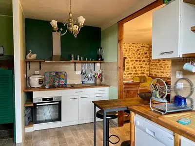 Cuisine ou kitchenette dans l'établissement Gîte La Cahute