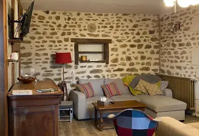 Coin salon dans l'établissement Gîte La Cahute
