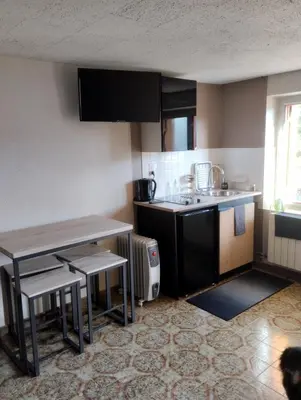 Cuisine ou kitchenette dans l'établissement Studio de la bastide