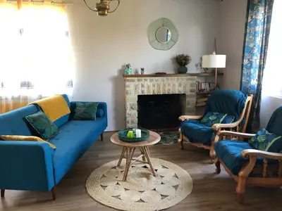 Coin salon dans l'établissement Gîte de Chavagnac