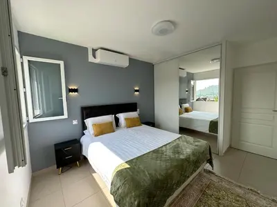 Un ou plusieurs lits dans un hébergement de l'établissement Jolie Appartement T3 Brive