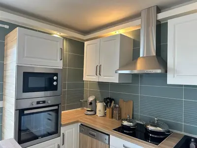 Cuisine ou kitchenette dans l'établissement Jolie Appartement T3 Brive