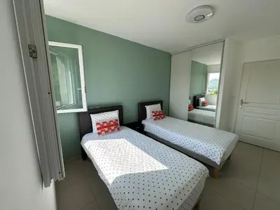 Un ou plusieurs lits dans un hébergement de l'établissement Jolie Appartement T3 Brive