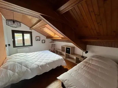 Un ou plusieurs lits dans un hébergement de l'établissement le Visiteur