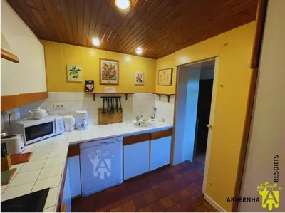 Cuisine ou kitchenette dans l'établissement L'Oustalou