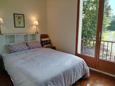 Un ou plusieurs lits dans un hébergement de l'établissement Maisonette next to woodland