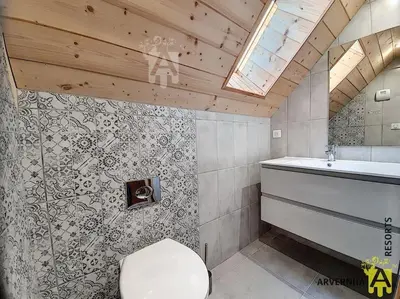 Salle de bains dans l'établissement Chalet Caranne