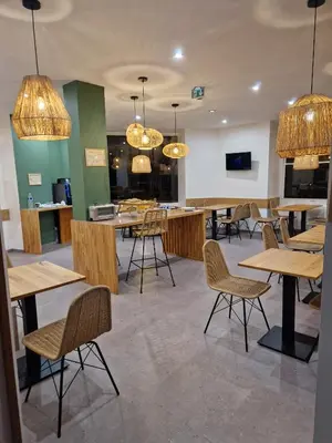 Cuisine ou kitchenette dans l'établissement Phenix Hôtel Limoges