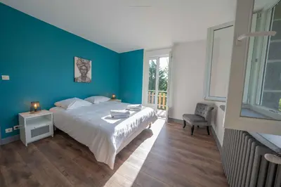 Un ou plusieurs lits dans un hébergement de l'établissement La Villa du Pont Romain