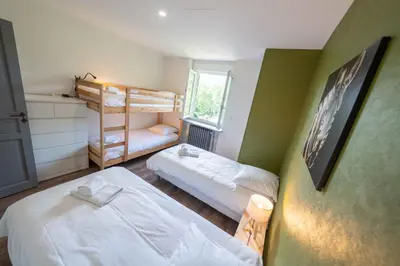 Un ou plusieurs lits dans un hébergement de l'établissement La Villa du Pont Romain