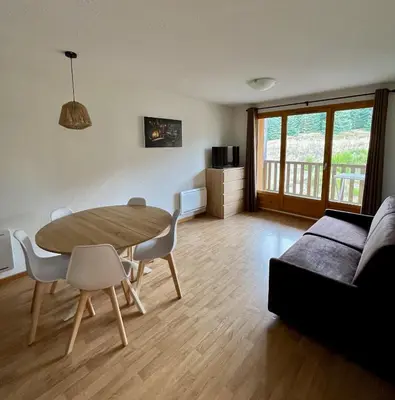 Télévision ou salle de divertissement dans l'établissement Appartement