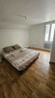 Un ou plusieurs lits dans un hébergement de l'établissement appartement fontaine Saint-Martin
