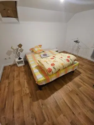 Un ou plusieurs lits dans un hébergement de l'établissement appartement fontaine Saint-Martin