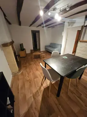 Coin salon dans l'établissement appartement fontaine Saint-Martin