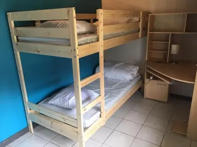 Un ou plusieurs lits superposés dans un hébergement de l'établissement Chalet à Besse 12 personnes