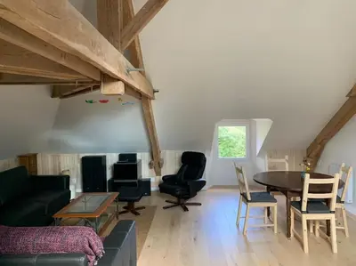 Coin salon dans l'établissement L'appartement du petit Bois