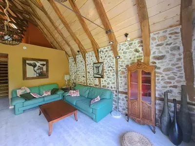 Coin salon dans l'établissement Gîte Val Souvigne