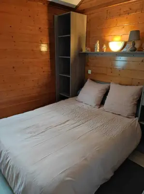 Un ou plusieurs lits dans un hébergement de l'établissement Chalet 31