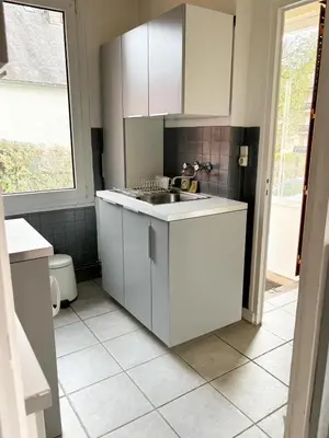 Cuisine ou kitchenette dans l'établissement La Petite Maison