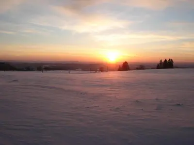 Lever ou coucher de soleil vu de la maison de vacances ou à proximité