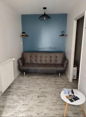 Coin salon dans l'établissement Le thermal