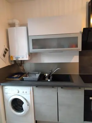 Cuisine ou kitchenette dans l'établissement Le thermal