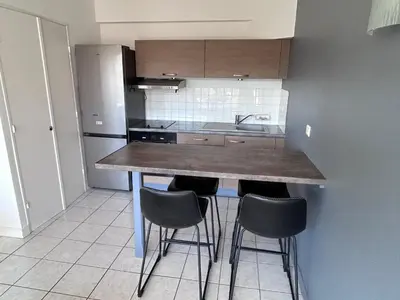 Cuisine ou kitchenette dans l'établissement Appartement centre ville et terrasse
