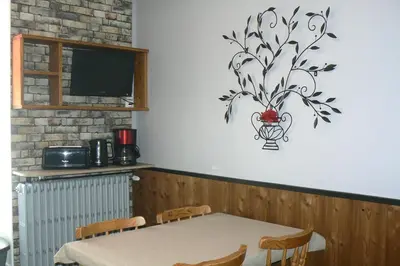 Cuisine ou kitchenette dans l'établissement La Coudraie Villa des Familles