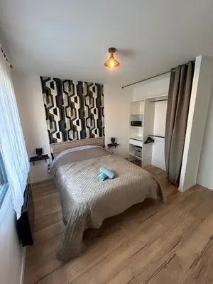 Un ou plusieurs lits dans un hébergement de l'établissement Paisible MAISON familiale - 4 Chambres - 2 SDB - terrasse et jardin - parking privé - Limoges