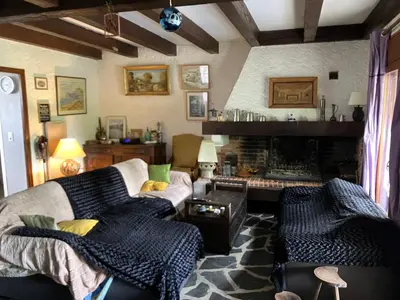 Coin salon dans l'établissement Chambres d hôte du Puy des Gardes