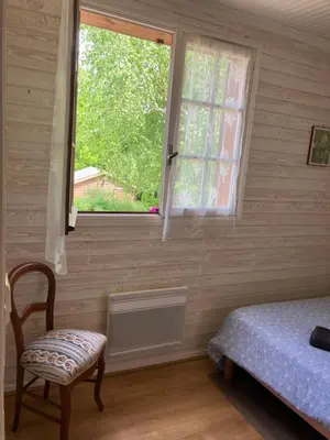 Un ou plusieurs lits dans un hébergement de l'établissement Chambres d hôte du Puy des Gardes