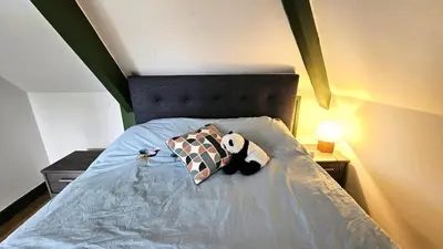 Un ou plusieurs lits dans un hébergement de l'établissement Gîte de France Pool house et tennis 3 épis - Gîte de France 7 personnes MAE-4611