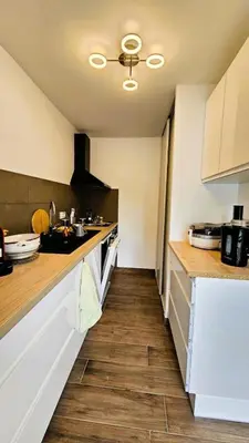 Cuisine ou kitchenette dans l'établissement Gîte de France Pool house 3 épis - Gîte de France 3 personnes MAE-4641