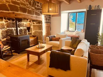 Coin salon dans l'établissement Maison authentique au cœur des montagnes, 8pers