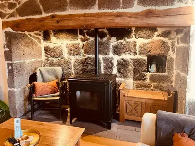 Coin salon dans l'établissement Maison authentique au cœur des montagnes, 8pers