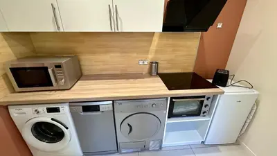 Cuisine ou kitchenette dans l'établissement Villa Les Moullières 14pers