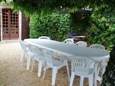 Jardin de l'établissement Charmante maison de campagne avec piscine partagée, 4 personnes - FR-1-616-424