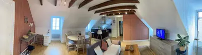 Télévision ou salle de divertissement dans l'établissement Appartement centre Mur de Barrez