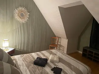 Un ou plusieurs lits dans un hébergement de l'établissement Appartement centre Mur de Barrez