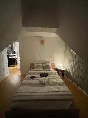 Un ou plusieurs lits dans un hébergement de l'établissement Appartement centre Mur de Barrez