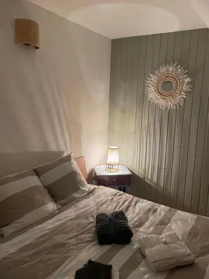 Un ou plusieurs lits dans un hébergement de l'établissement Appartement centre Mur de Barrez