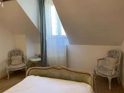 Un ou plusieurs lits dans un hébergement de l'établissement T2 Cosy et Confortable au coeur d'Aubusson