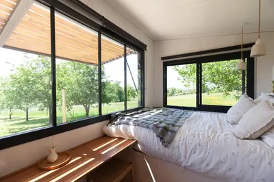 Un ou plusieurs lits dans un hébergement de l'établissement Pépiite Lodge Nature et Spa