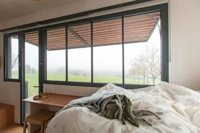 Un ou plusieurs lits dans un hébergement de l'établissement Pépiite Lodge Nature et Spa