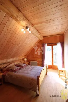 Un ou plusieurs lits dans un hébergement de l'établissement Chalet de Fougerousse