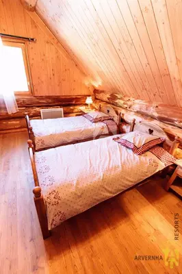 Un ou plusieurs lits dans un hébergement de l'établissement Chalet de Fougerousse