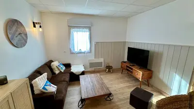 Télévision ou salle de divertissement dans l'établissement Les Oréades Le Mont Dore 10pers