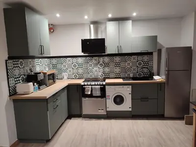Cuisine ou kitchenette dans l'établissement O fil de l'o